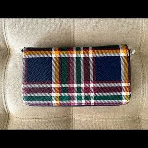 Thirty one (31) plaid wallet